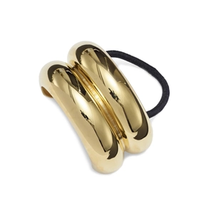 Minimalist gold alloy hair tie featuring double thick curved metallic tubes in glossy finish