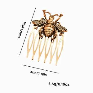 Vintage bronze bee hair comb with leaf motifs and detailed metal engravings, 5cm size