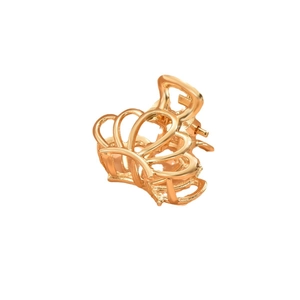 Elegant gold hollow butterfly metal hair claw clip with polished finish on white background