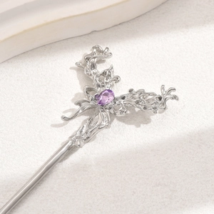 Silver vintage hair pin with purple teardrop gemstone and intricate floral design