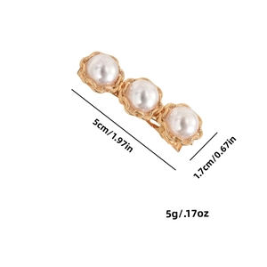 Elegant pearl hair clip with gold metal base and floral petal design on white background