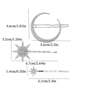 Three-piece silver hair clip set with sun moon and star shapes featuring crystal rhinestones