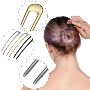 Elegant U-shaped metal hair pins in gold and silver finishes for bridal hair styling