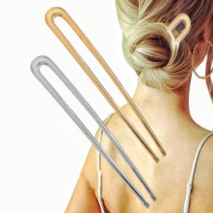 Elegant U-shaped hairpins set in gold and silver finish with minimalist geometric design