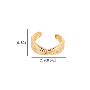 Detail view of gold twisted ring with textured surface and 0.8cm width specifications