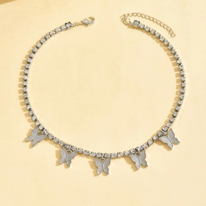 Detailed view of silver butterfly choker necklace with rhinestones and lobster clasp
