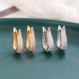 U-shaped micro-pave zircon hoop earrings in gold and silver finish with full crystal