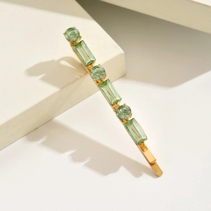 Barrette élégante en alliage doré avec six strass vert clair facettés alternés