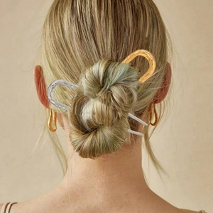 U-shaped hammered metal hair sticks in gold and silver for elegant bun styling