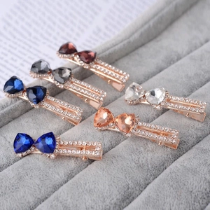 Barrettes à cheveux nœud en cristal étincelant de diverses couleurs avec fini or rose
