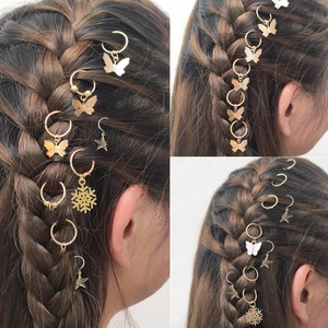 Three-way split view of golden butterfly and star charms woven into braided hair styling