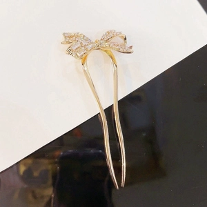 Elegant gold U-shaped hair pin with bow design and zircon stones for women
