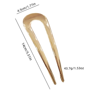 Minimalist U-shaped metal hair pin in gold finish with dimensions 14cm x 4.5cm
