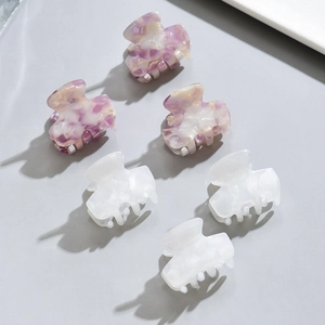 Set of 6 small acetate claw clips in purple marble and translucent white colors
