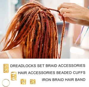 Detailed set of golden hollow metal cuffs and hair rings for dreadlock braid styling
