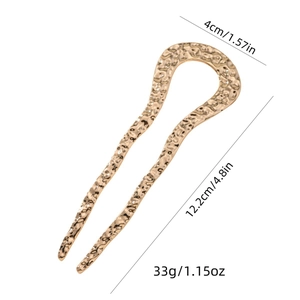 Golden U-shaped hammered metal hair pin for bun styling, size 12.2cm by 4cm
