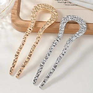 U-shaped hammered metal hairpins in gold and silver finish for elegant hair styling