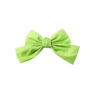 Fresh green fabric hair bow clip set with natural texture on a clean white background