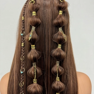 Detailed view of 31pcs gold bohemian dreadlock hair rings with charms on braided hair