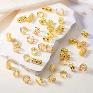 Set of 40 pieces golden bohemian dreadlock beads with intricate cutout floral patterns