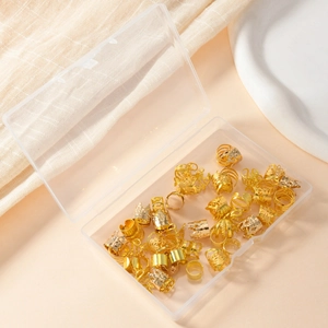 70 pieces of gold hollow hair rings for dreadlocks stored in a clear plastic box