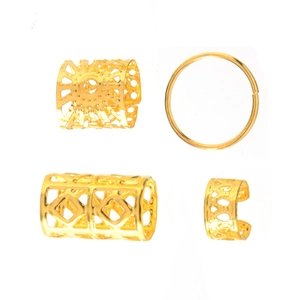 Close-up of four gold hollow hair ring styles including sunburst and geometric designs