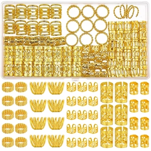 Close-up of golden alloy dreadlock rings and hollow hair cuffs set in a storage box