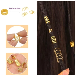 Macro detail of adjustable gold hollow flower hair rings and spiral dreadlock accessories