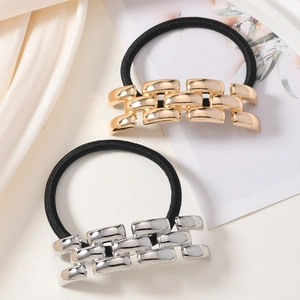 Minimalistische Haargummis aus Metalllegierung in Gold und Silber mit elastischem Band