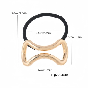 Élastique à cheveux noir avec ornement papillon en métal doré et détails de dimensions