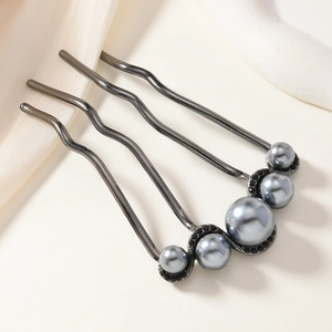 Elegant gunmetal grey hair fork with grey pearls and four wavy prongs for buns