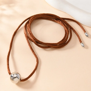 Minimalist adjustable brown cord necklace with a large polished silver sphere pendant
