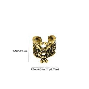 Vintage hollow U-shaped ear cuff with golden filigree patterns and retro finish