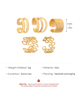 Detailed close-up of 5pcs gold vintage ear cuff set with hollow leaf and multi-layer patterns