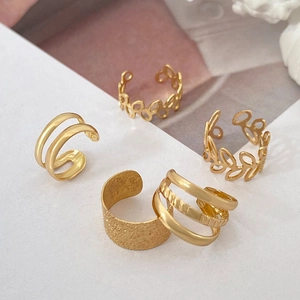 Five-piece vintage gold C-shaped ear cuff set with hollow leaf and textured designs