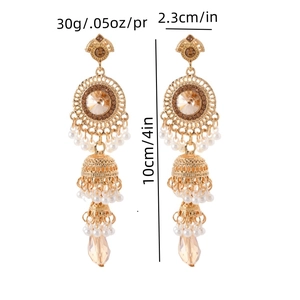 Boucles d'oreilles pendantes style thaïlandais avec pierres champagne et cloches