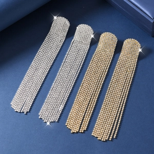 Exaggerated long fringe tassel earrings with rhinestones in silver and gold colors