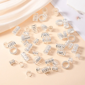 50pcs silver hollow hair rings with spiral and floral patterns for dreadlock styling