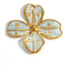 Detail of 18K gold-plated flower pendant with light blue enamel and floral patterns