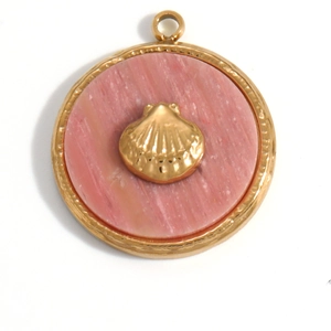 Detail of 18K gold plated round pendant with pink resin finish and a golden shell motif