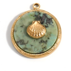 Detail of round green natural stone pendant with golden scallop shell and 18K gold plating
