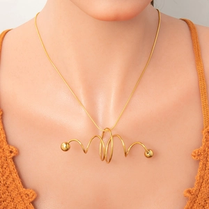 Double-layered 18k gold butterfly necklace with aesthetic wave pendant on model