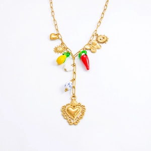 Detail of 18k gold plated necklace with sun, heart pendants and colorful beads