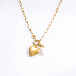 Golden heart locket necklace with paperclip chain, white pearls and a crystal letter A