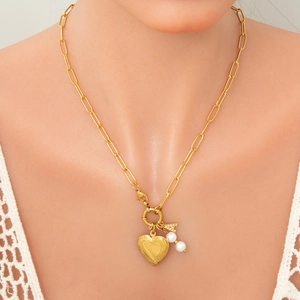 Golden heart locket necklace with pearl and letter A pendant on paperclip chain