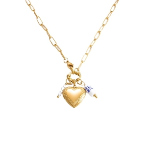Golden heart locket necklace with paperclip chain and blue porcelain bead detail