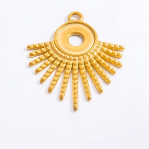 Detailed macro of 18k gold sunburst evil eye pendant for DIY jewelry design