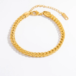 Detailed macro view of 18k gold plated wheat chain bracelet with adjustable clasp