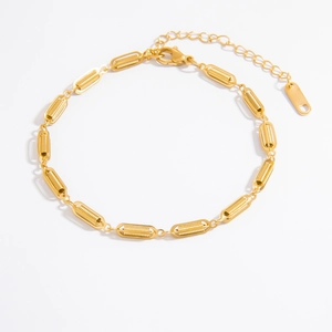 Detail view of 18k gold plated titanium chain bracelet with lobster clasp and spiral links