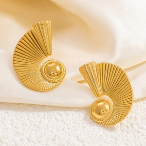 Detailed close-up of 18k gold-plated wavy earrings with elegant sunburst texture detail